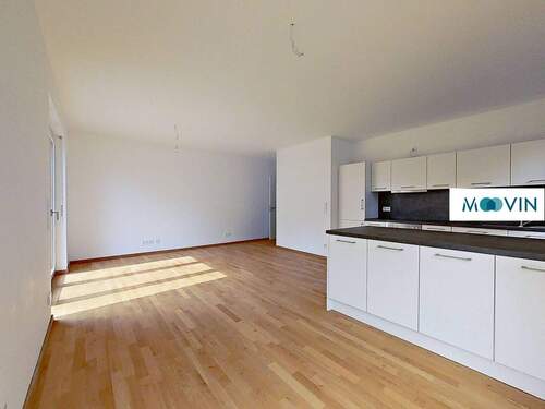 Ansicht III: Wohn- und Esszimmer mit offener Küche - 