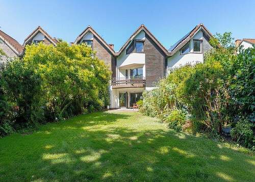 Gartenansicht - EVERNEST: Ihr neues Zuhause in Wiesbaden-Aukamm stilvolles RMH mit Platz für die ganze Familie