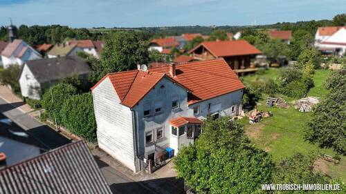Luftbildaufnahme - 4 Zimmer Einfamilienhaus zum Kaufen in Hilst