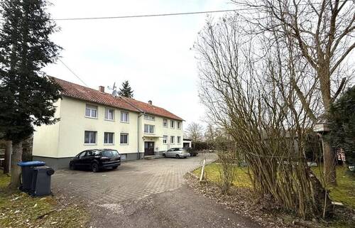 Außenansicht mit Garten - Wohnung in begehrter Lage - 220.000,00 EUR Kaufpreis, ca.  65,00 m² Wohnfläche