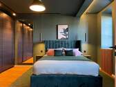 Schlafzimmer - Eleganz trifft Urbanität: Luxuriöse Wohnung im Herzen der Stadt