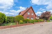 Ansicht von der Straße - 7 Zimmer Einfamilienhaus zum Kaufen in Bramsche