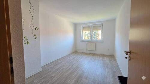 Schlafzimmer - 3 Zimmer Etagenwohnung zur Miete in Großröhrsdorf