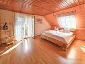 Schlafzimmer mit Balkon - 