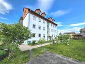 Ansicht - Gepflegtes 8-Familienhaus mit Garagenhof auf großzügigem Grundstück und Entwicklungspotenzial