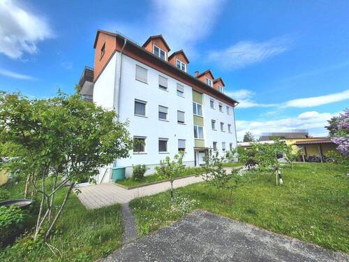 Ansicht - Gepflegtes 8-Familienhaus mit Garagenhof auf großzügigem Grundstück und Entwicklungspotenzial