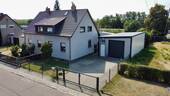 Objektansicht - Einziehen und wohlfühlen! Moderne Doppelhaushälfte mit Garten und großer Garage zu verkaufen!