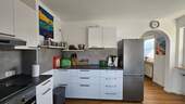 Küche mit Sitzmöglichkeit - Etagenwohnung mit 86,00 m² in Reiskirchen zur Miete