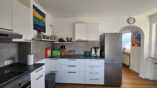 Küche mit Sitzmöglichkeit - Etagenwohnung mit 86,00 m² in Reiskirchen zur Miete