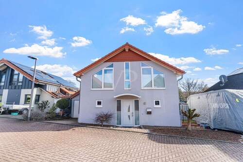 Frontalblick - Freistehendes Einfamilienhaus mit sonnigem Garten - nachhaltig wohnen & Zuhause ankommen