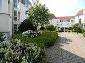 Hausansicht Hofseite - Schöne großzügige 3-Raum-Wohnung im 1. OG mit Einzelgarage - langjährig vermietet