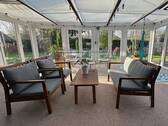 Im hellen Wintergarten - 