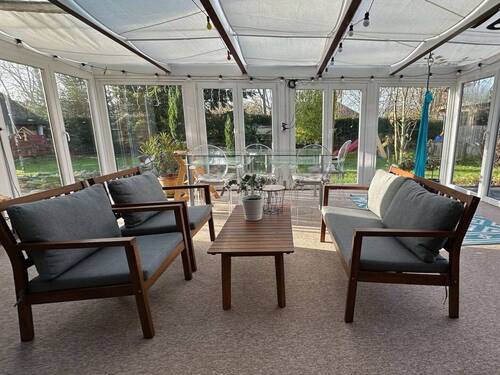 Im hellen Wintergarten - 
