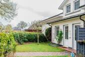 2 Garten Eingang - Etagenwohnung mit 135,00 m² in Freienwill zum Kaufen