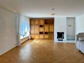 Wohnraum mit Kamin (EG) - 