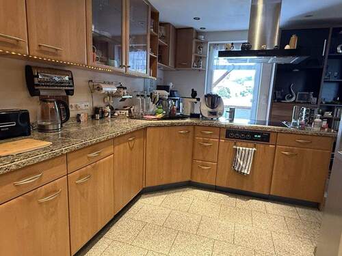 Offene Küche mit Zugang auf die Terrasse - 