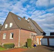 Ahlener Norden, ein Haus mit sonnigem Garten, Terrasse, Balkon und Doppelgarage.
