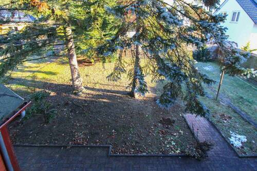 Blick in den Garten - 5 Zimmer Einfamilienhaus zum Kaufen in Berlin