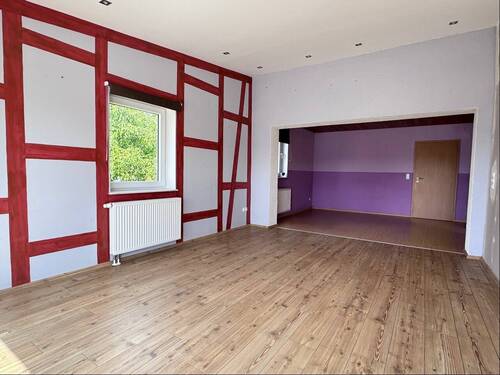 Wohnzimmer Wohnung links - Mehrfamilienhaus, Wohnhaus mit 170,00 m² in Windsbach zum Kaufen