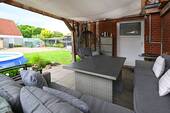 Die gemütliche Terrasse mit direktem Gartenzugang - 