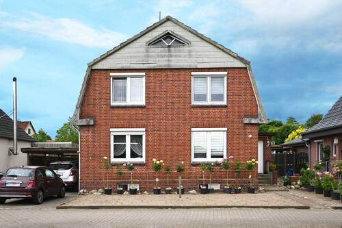 Die Außenansicht der Immobilie - 5 Zimmer Einfamilienhaus zum Kaufen in Uetersen