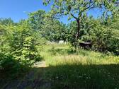 Blick von der Terrasse in den hinteren Grundstücksteil - Grundstück in Erlangen zum Kaufen