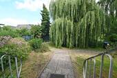 Eingang mit Blick zum Park - 