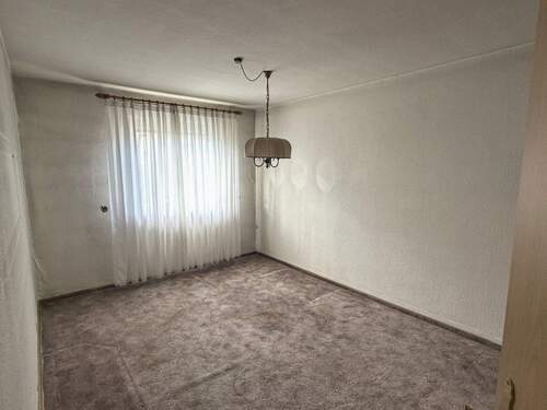 Eines von zwei Schlafzimmern im EG - 