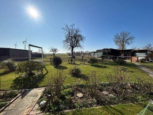 Garten - Mehrfamilienhaus, Wohnhaus mit 179,00 m&sup2; in Bruchhausen-Vilsen zum Kaufen