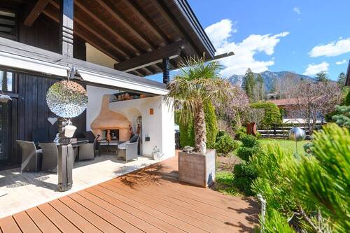 Überdachte Terrasse mit Außenkamin - 