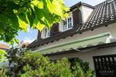 Hinteransicht Haus - **Gepflegtes Einfamilienhaus mit traumhaftem Gartengrundstück in Feldrandlage**