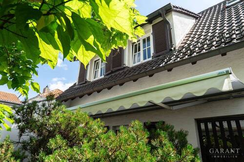 Hinteransicht Haus - **Gepflegtes Einfamilienhaus mit traumhaftem Gartengrundstück in Feldrandlage**