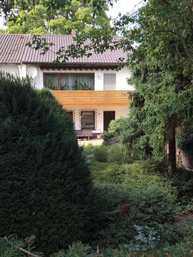 Hausansicht Garten - Sehr gepflegtes Endhaus auf traumhaftem Grundstück in gesuchter Lage Ma-Niederfeld