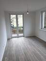 Wohnung OG mit Balkon - 