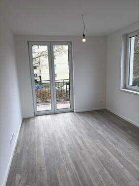 Wohnung OG mit Balkon - 