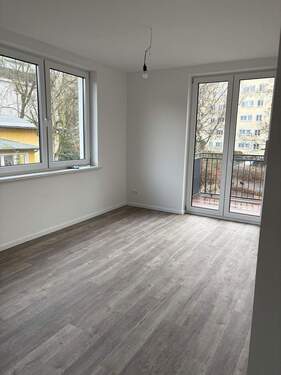 Wohnung OG mit Balkon - 