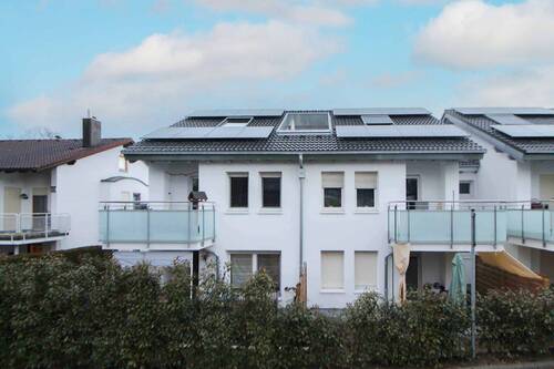 Frontansicht - Attraktive 3-Zimmer-Wohnung auf zwei Ebenen mit Süd-Terrasse und Garage