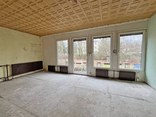 Wohnzimmer im EG - 5 Zimmer Einfamilienhaus zum Kaufen in Eberswalde