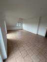 Wohnzimmer (2).JPG - schöne 2-Zimmer Dachgeschosswohnung mit Balkon in Seligenstadt