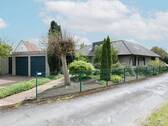 Ansicht Haupteingang - Vielseitige Traumimmobilie - Zweifamilienhaus mit Erdwärme und idyllischem Gartenparadies in Löhne