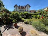 Bild1 - Tolle 3,5 Zimmer EG Wohnung mit sonnigen Terrassen und Gartenanteil