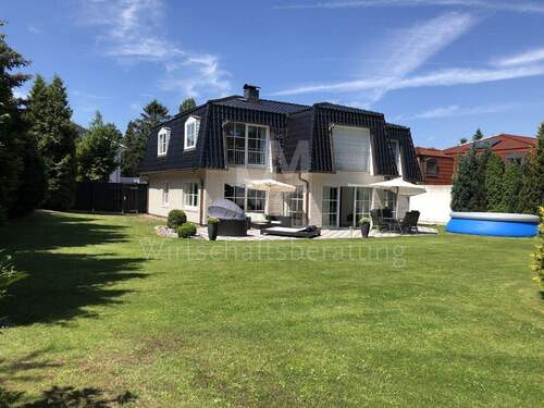 Hausansicht - Einfamilienhaus mit 319,00 m&sup2; in Isernhagen / Altwarmbüchen zum Kaufen