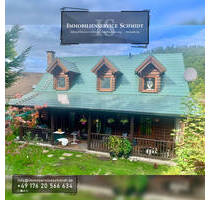 Amerikanisches Blockbohlenhaus Holzhaus Freistehendes Einfamilienhaus auf einem schön angelegten Grundstück in Schalksmühle (Strücken)