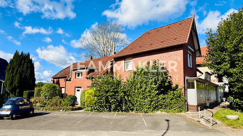 Frontansicht - 5 VERMIETETE EINHEITEN: Wohn- und Geschäftshaus mit Entwicklungspotenzial