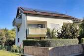 Ansicht - Gepflegte 4 ½ -Zimmer-DG-Wohnung mit Garage und Top-Aussicht