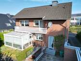 Bild 1 - Freundliches Einfamilienhaus mit Einliegerwohnung in ruhiger und gut angebundener Lage