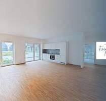 Lichtdurchflutete 3-Zi.-Erdgeschosswohnung mit Terrasse und moderner Einbauküche im Neubauquartier 