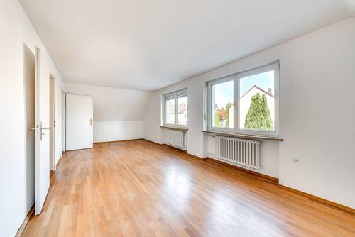 Zimmer_im_Dachgeschoss - Einfamilienhaus mit 201,00 m² in München zum Kaufen