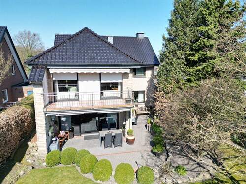 Bild 1 - Großzügig wohnen in Ibbenbüren - charmantes Einfamilienhaus mit Einliegerwohnung