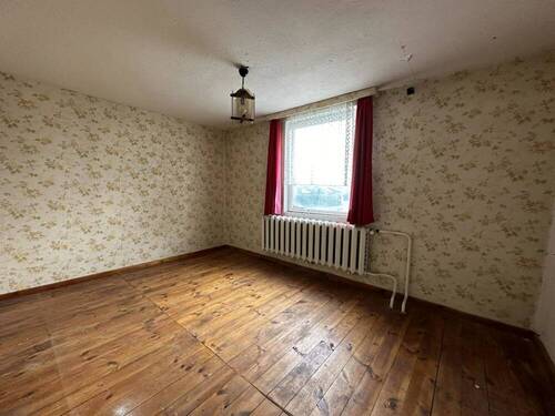 Zimmer im Dachgeschoss - 